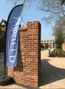 Flag at first open day at new Fairfield